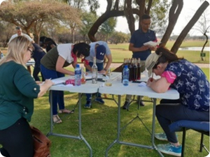 team building event with wine and art